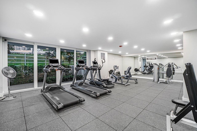 gym featuring floor to ceiling windows