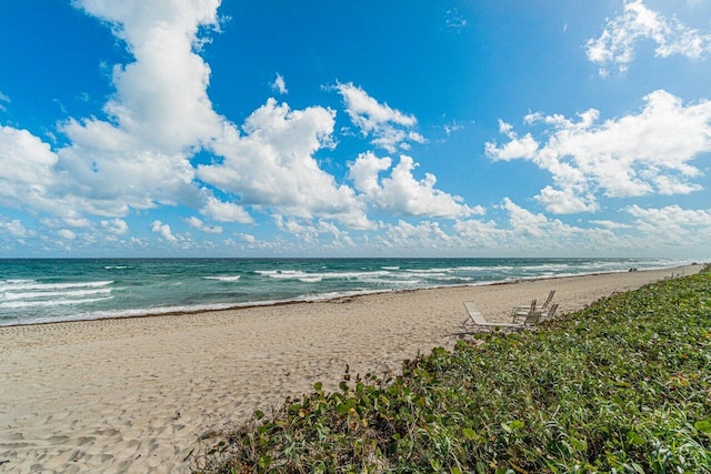 property view of water featuring a beach view