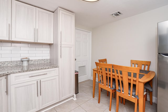 view of tiled dining space