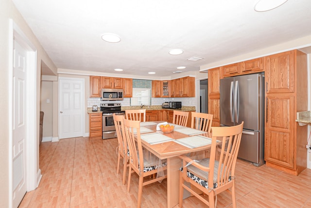 dining area with sink