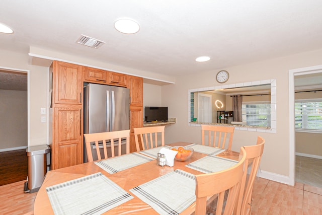 dining room featuring light wood-type flooring