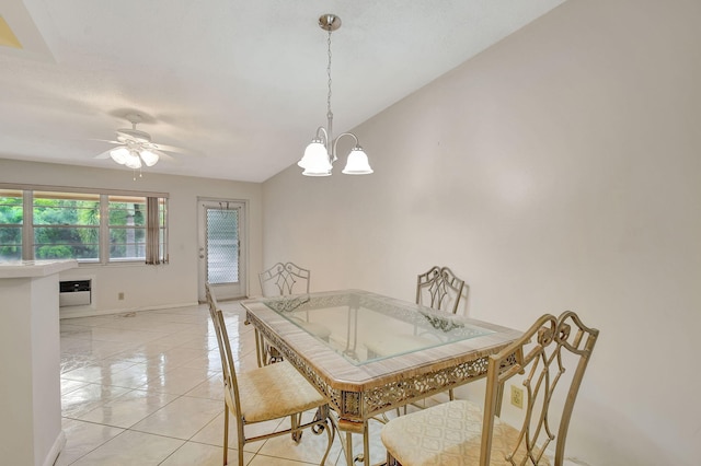 dining area with ceiling fan with notable chandelier and a wall mounted air conditioner