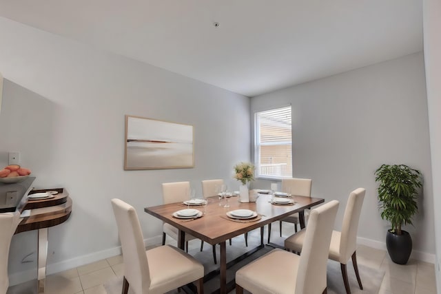 dining area with light tile patterned floors