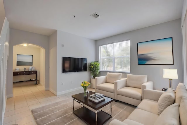 living room with light tile patterned floors