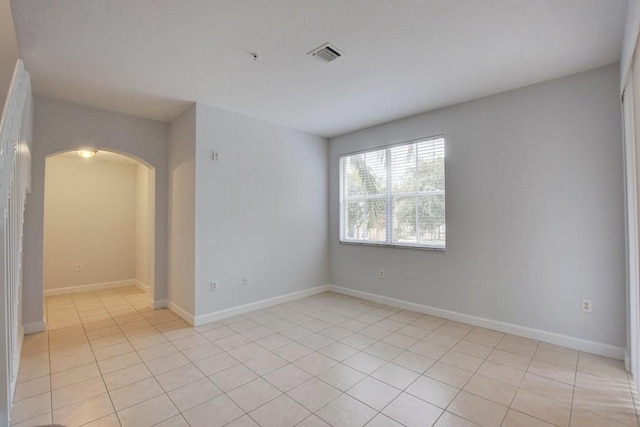 view of tiled spare room