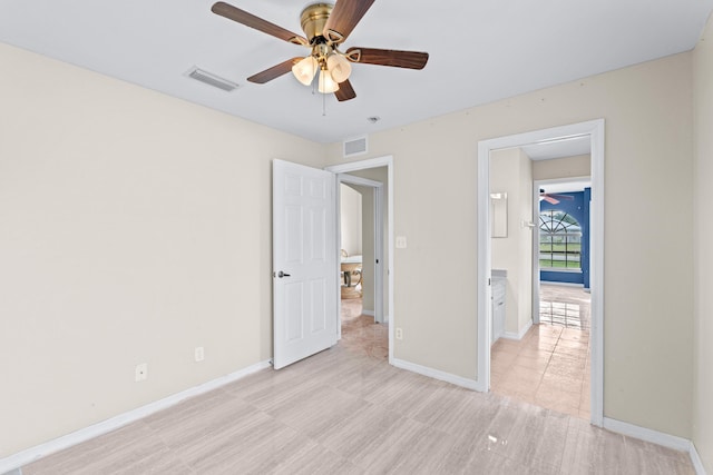 unfurnished bedroom featuring light hardwood / wood-style floors and ceiling fan