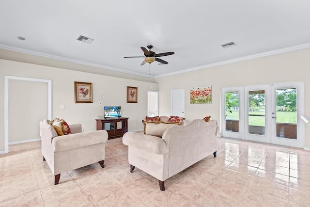 tiled living room with ornamental molding, french doors, and ceiling fan