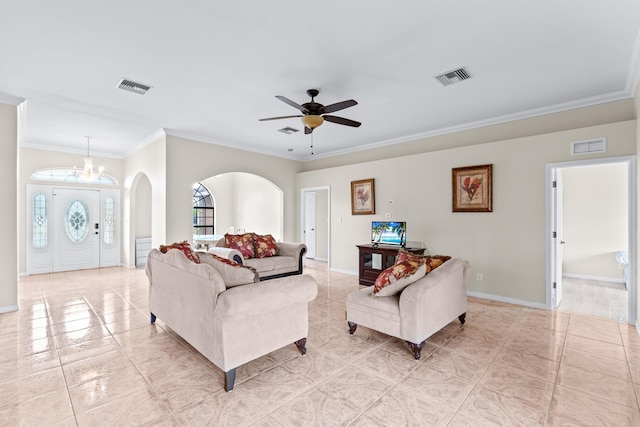 living room featuring crown molding, ceiling fan with notable chandelier, and light tile patterned floors