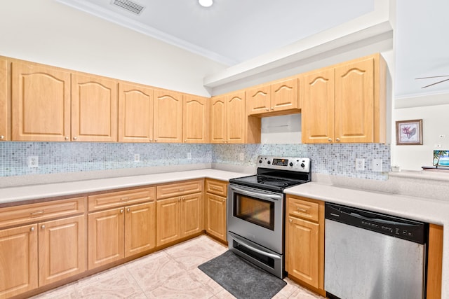 kitchen featuring crown molding, tasteful backsplash, and stainless steel appliances