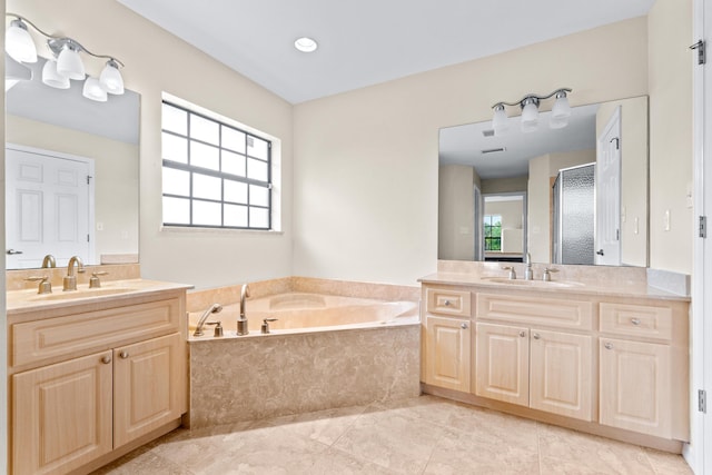 bathroom with vanity, tile patterned floors, shower with separate bathtub, and plenty of natural light