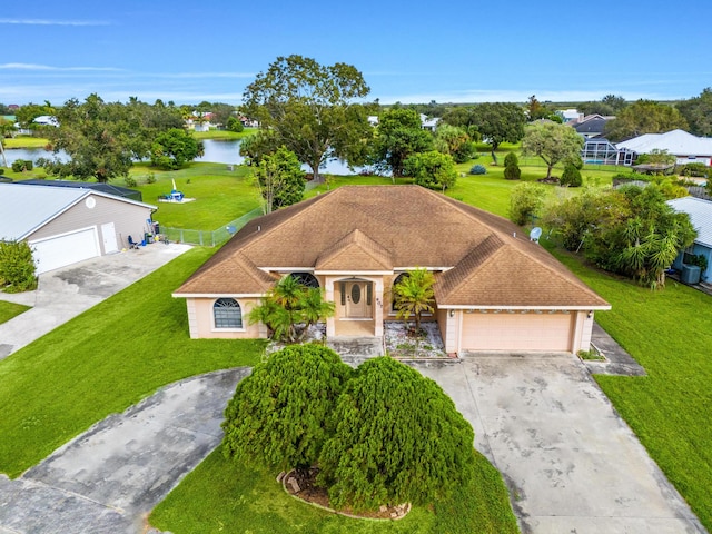 birds eye view of property featuring a water view