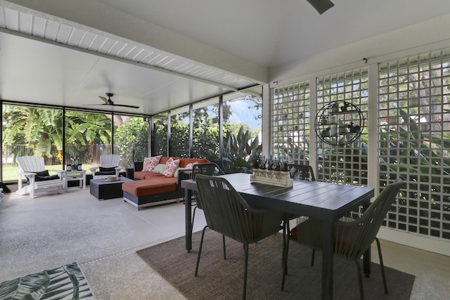 sunroom / solarium featuring ceiling fan