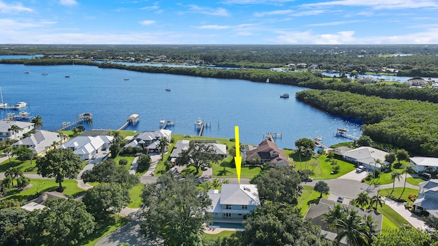 drone / aerial view with a water view