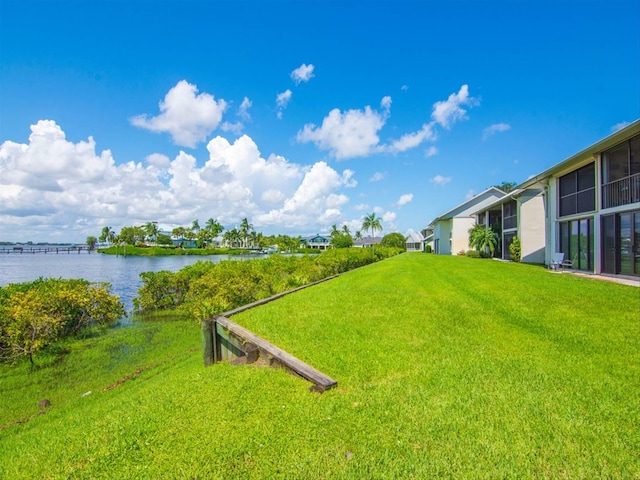 view of yard with a water view