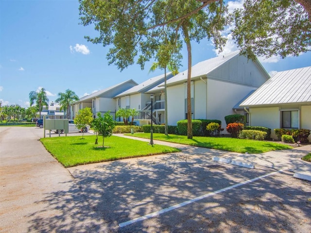 exterior space featuring a front yard