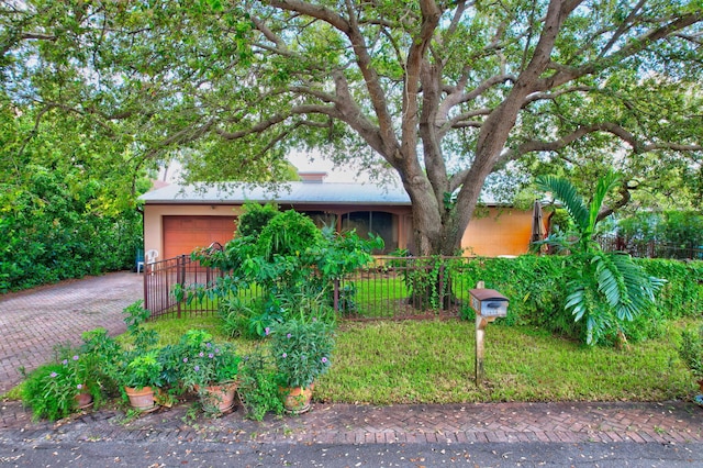 view of front of house with a garage