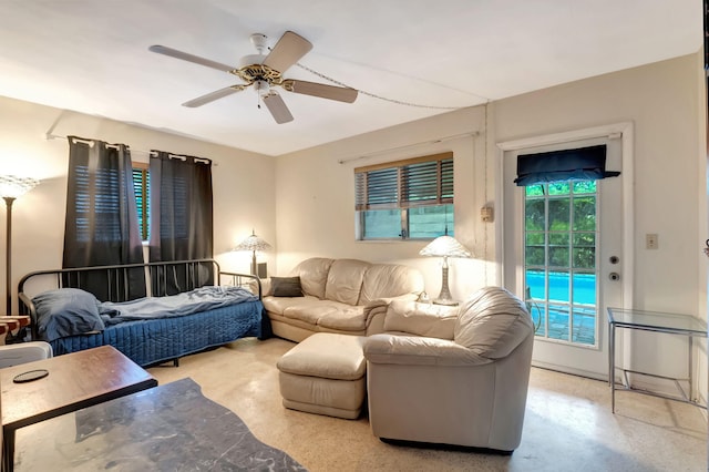 living room featuring ceiling fan