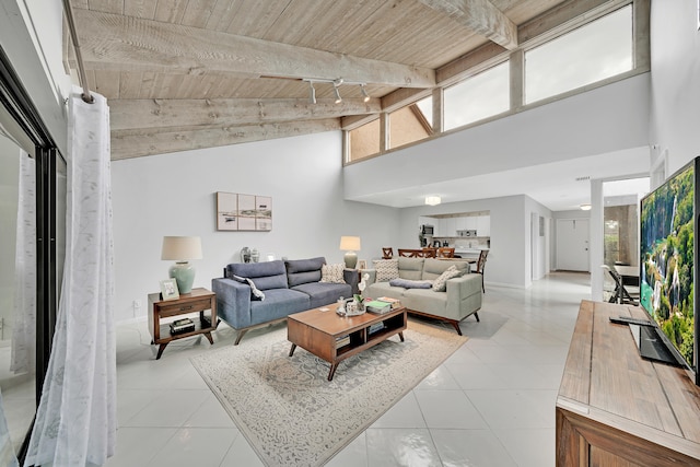 tiled living room with beam ceiling, high vaulted ceiling, and wooden ceiling