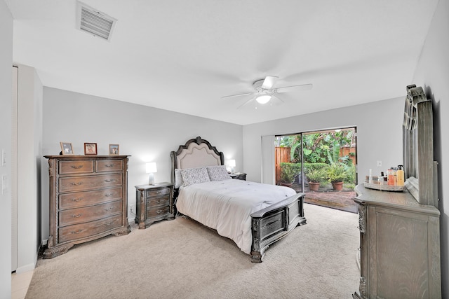 bedroom with access to outside, light carpet, and ceiling fan