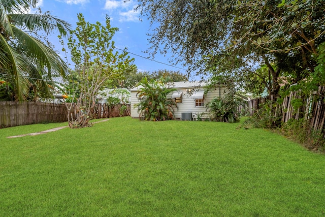 view of yard featuring central AC