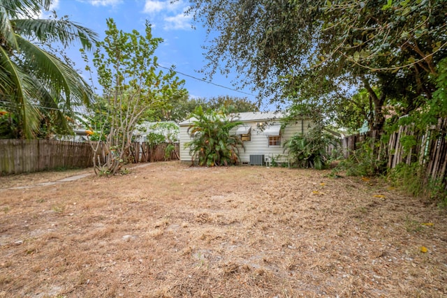 view of yard featuring central AC unit