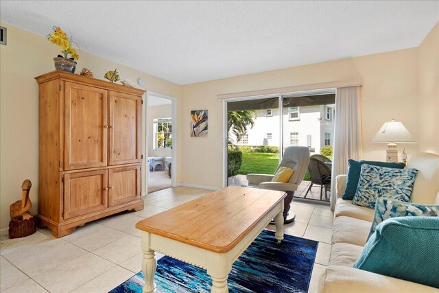 living room featuring light tile patterned floors