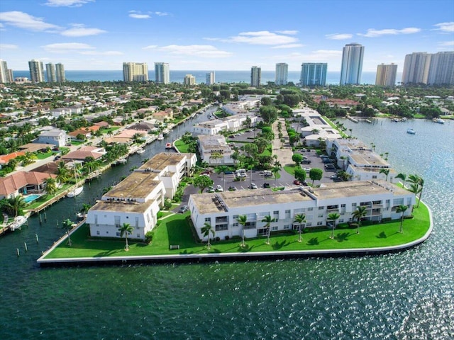 drone / aerial view with a water view