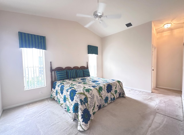 bedroom featuring lofted ceiling, ceiling fan, and carpet floors