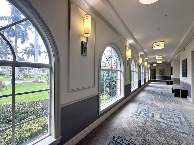 carpeted dining room with ceiling fan