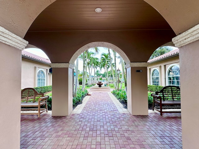 surrounding community featuring a patio