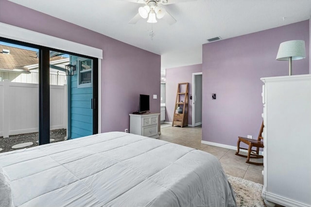 tiled bedroom with access to outside and ceiling fan