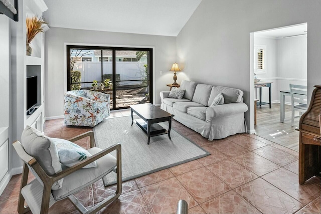 living room with lofted ceiling