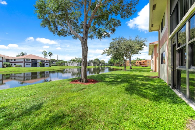 view of yard featuring a water view