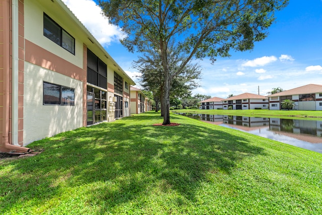 view of yard with a water view