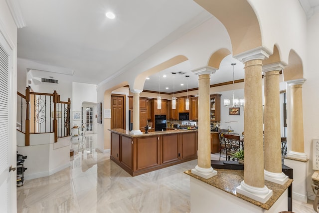 welcome area featuring an inviting chandelier