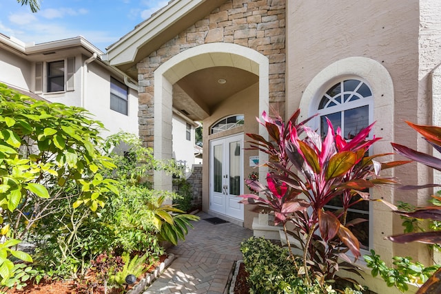 entrance to property featuring french doors