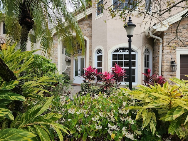 doorway to property featuring french doors