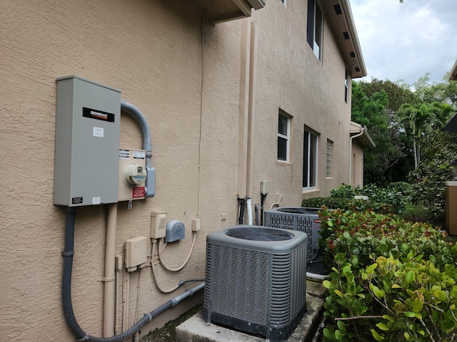 view of home's exterior with central AC