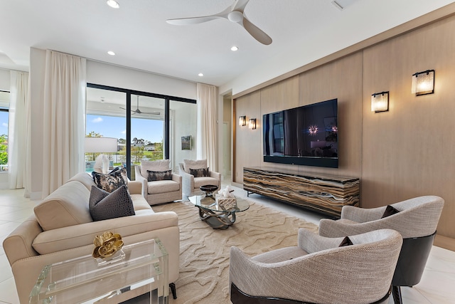 tiled living room with ceiling fan