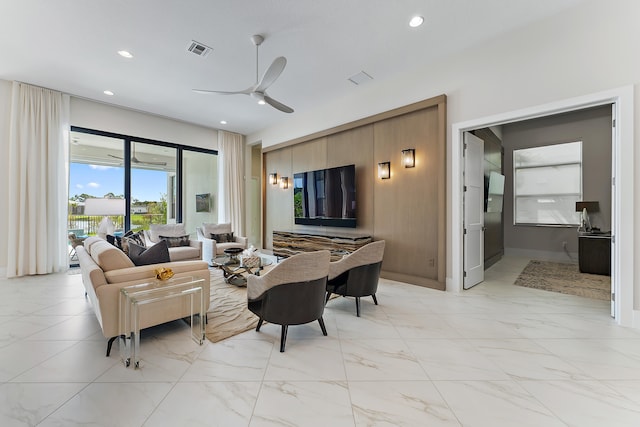 living room featuring ceiling fan