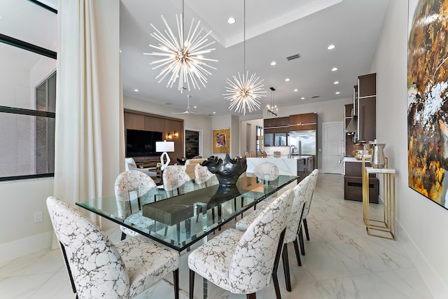 dining room with a notable chandelier