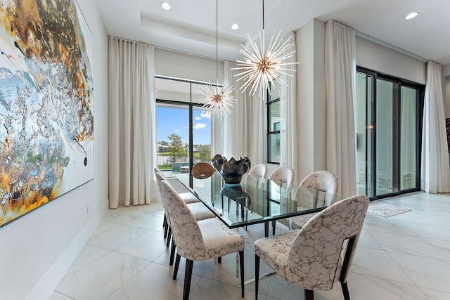 dining space featuring a chandelier