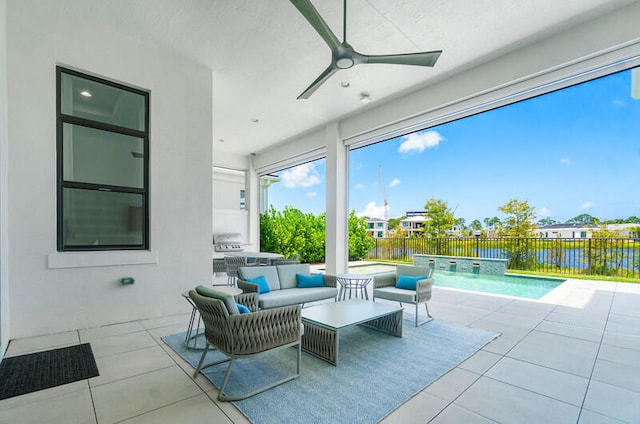 view of patio / terrace with ceiling fan, a fenced in pool, and an outdoor hangout area