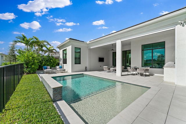 view of pool with an outdoor living space, ceiling fan, and a patio area