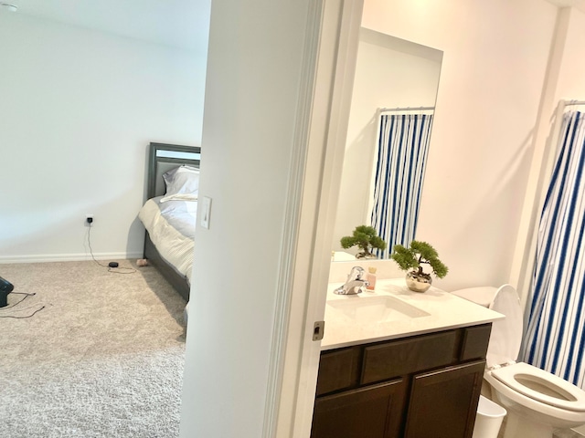 bedroom with carpet flooring and sink