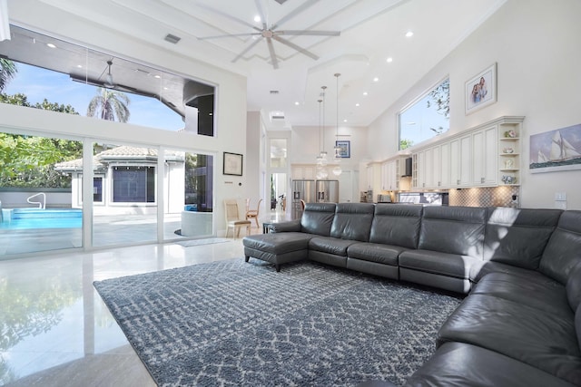 6595 NW 32nd Ter, Boca Raton, FL 33496 - living area featuring a towering ceiling, ceiling fan, marble tiled flooring, and recessed lighting