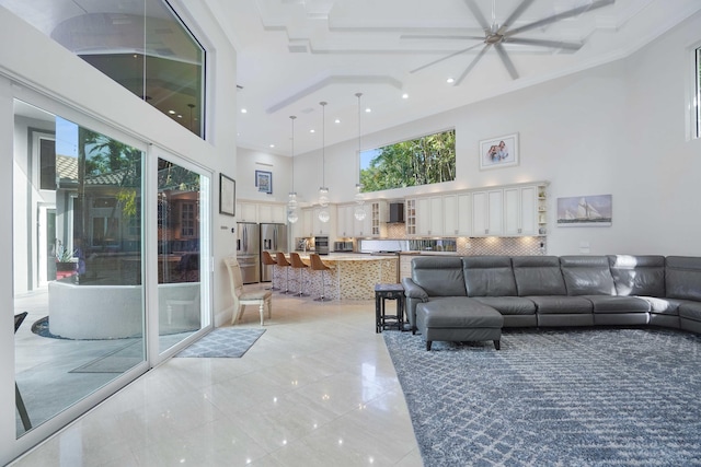 6595 NW 32nd Ter, Boca Raton, FL 33496 - living area with a high ceiling, plenty of natural light, and recessed lighting