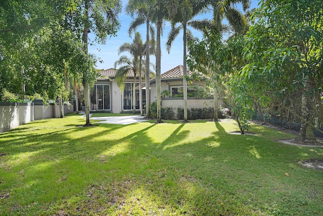 6595 NW 32nd Ter, Boca Raton, FL 33496 - back of house featuring stucco siding and a tile roof