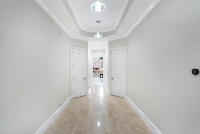 6595 NW 32nd Ter, Boca Raton, FL 33496 - corridor featuring baseboards, ornamental molding, and a tray ceiling