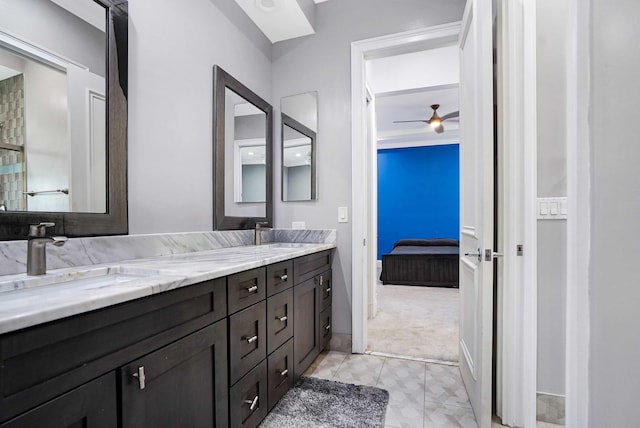 6595 NW 32nd Ter, Boca Raton, FL 33496 - bathroom featuring connected bathroom, double vanity, and ceiling fan